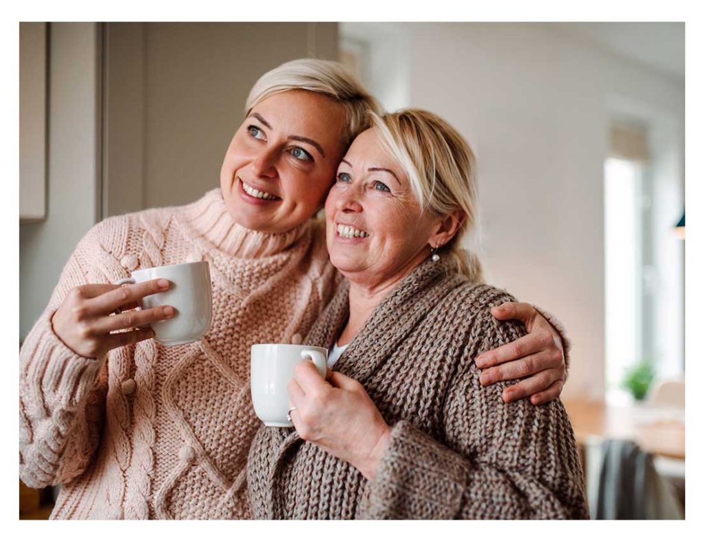 two women comforting each other