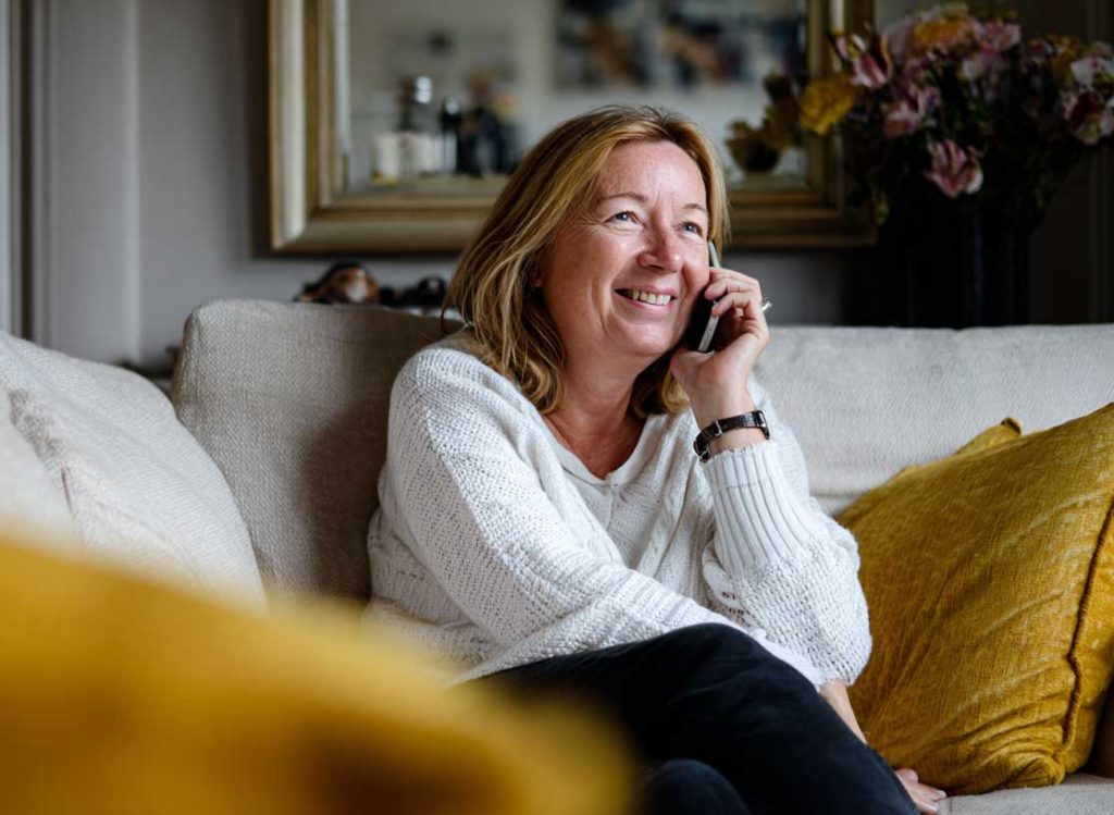 middle-aged woman on the phone