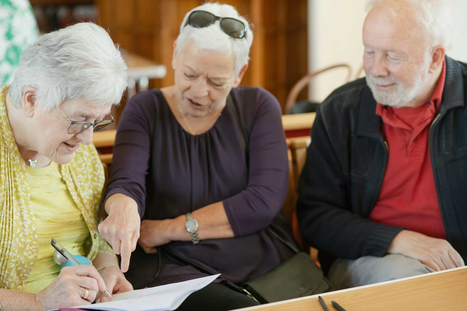Photo of person getting help writing their will